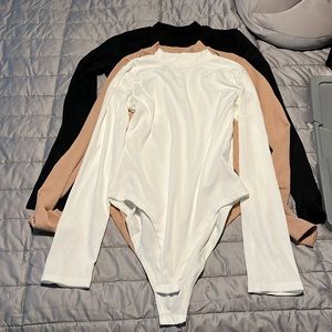 3 Ribbed body suits